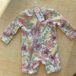 Just one you by Carters one piece zipper bathing suit. Floral design.